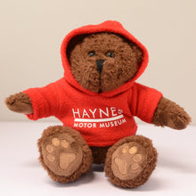 Load image into Gallery viewer, Charlie Bear with Hoodie - Haynes Motor Museum Logo