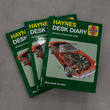 Load image into Gallery viewer, Three Haynes Desk Diaries on a gray surface
