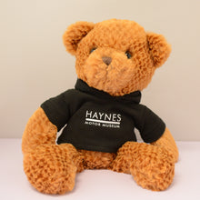 Load image into Gallery viewer, Jango Bear with Hoodie - Haynes Motor Museum Logo

