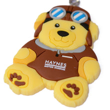 Load image into Gallery viewer, Pilot Bear Keyring - Haynes Motor Museum Logo
