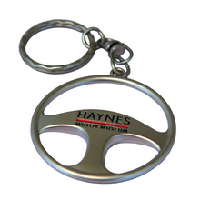 Load image into Gallery viewer, Steering Wheel Keyring - Haynes Motor Museum Logo
